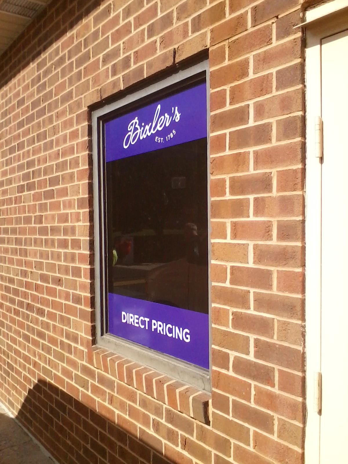 Window Graphics Installation — Signs & Banners